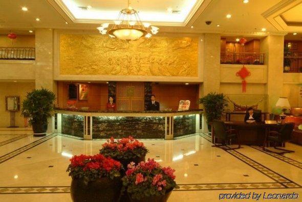 Qingdao Oceanwide Elite Hotel Interno foto